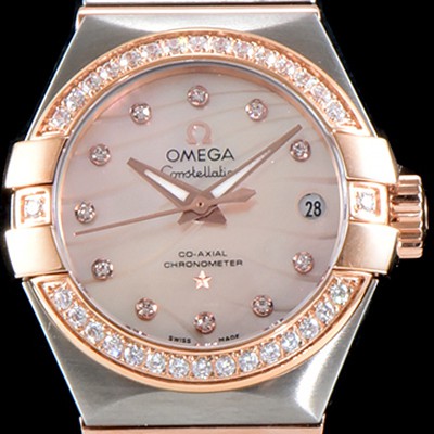레플리카 [오메가] 남성용 여성 컬렉션 컨스틀레이션 123.25.27.20.55.005 오메가 코-액시얼 27MM 다이아몬드 세팅 베젤 자개 다이얼 18K 로즈골드 콤비 쿼츠 무브먼트 OMG4112  